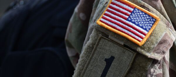 Нашивка на форме военнослужащего армии США. Архивное фото Нашивка на форме военнослужащего армии США. Архивное фото - Sputnik Южная Осетия