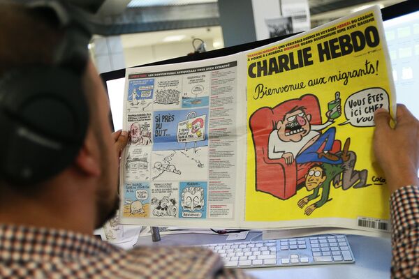 Издание Charlie Hebdo опубликовало карикатуры, героем которых стал утонувший сирийский мальчик Айлан Курди - Sputnik Южная Осетия