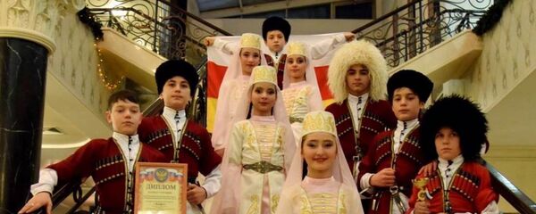 Детский ансамбль Кафт на фестивале в Москве Детский ансамбль Кафт на фестивале в Москве - Sputnik Хуссар Ирыстон