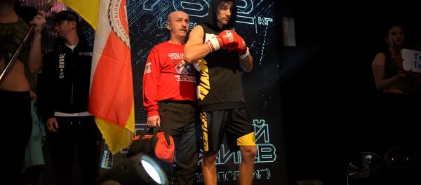 Георгий Тиджиев выходит на ринг Георгий Тиджиев выходит на ринг - Sputnik Южная Осетия