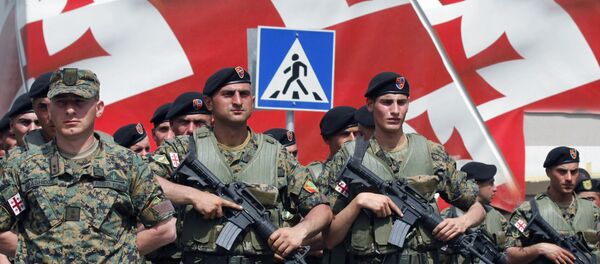 Грузинские военнослужащие в День независимости Грузии Грузинские военнослужащие в День независимости Грузии - Sputnik Хуссар Ирыстон