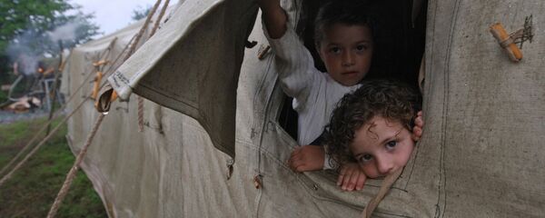 Беженцы из Цхинвала Беженцы из Цхинвала - Sputnik Южная Осетия