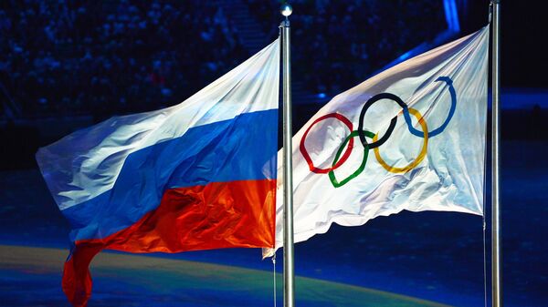 Олимпийский и российский флаги - Sputnik Южная Осетия
