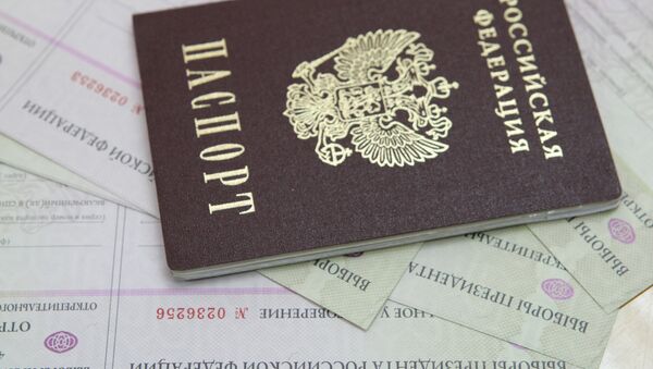 Выдача открепительных удостоверений для голосования на выборах президента РФ - Sputnik Южная Осетия