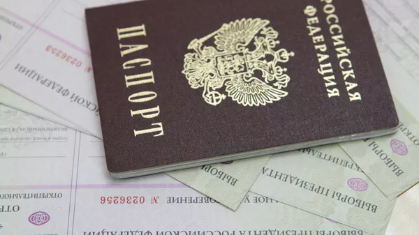 Выдача открепительных удостоверений для голосования на выборах президента РФ - Sputnik Южная Осетия