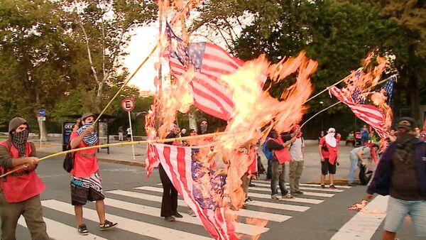 Жители Буэнос-Айреса жгли флаги США в знак протеста против визита Обамы - Sputnik Южная Осетия