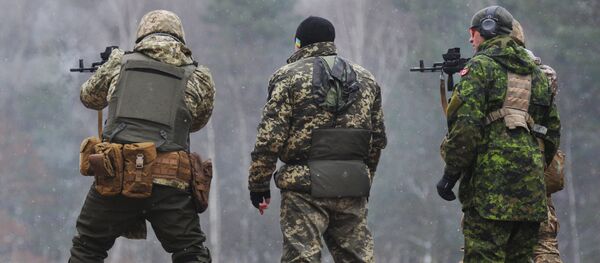 Обучение украинских военнослужащих канадскими инструкторами по программе UNIFIER на Яворивском полигоне Обучение украинских военнослужащих канадскими инструкторами по программе UNIFIER на Яворивском полигоне - Sputnik Южная Осетия