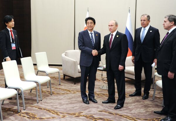 Президент России Владимир Путин и премьер-министр Японии Синдзо Абэ - Sputnik Южная Осетия