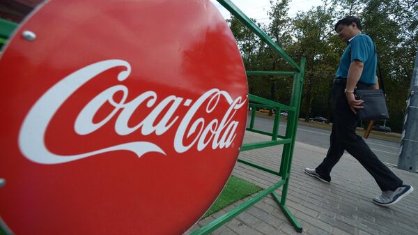 Эмблема компании Coca-Cola. - Sputnik Южная Осетия
