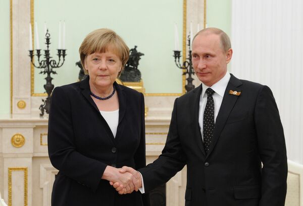 Президент России В.Путин и канцлер Федеративной Республики Германия А.Меркель - Sputnik Южная Осетия