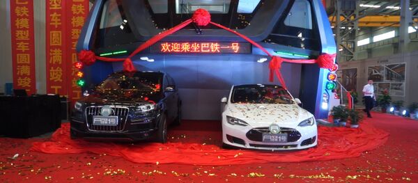 Транспорт будущего, или Как выглядит надземный автобус в Китае - Sputnik Южная Осетия