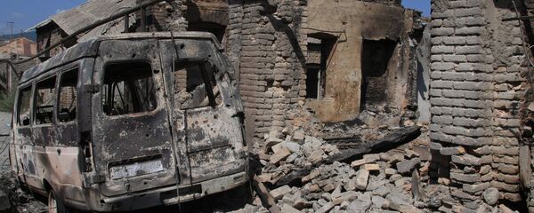 Разрушенные дома в городе Цхинвал, подвергшемся нападению грузинских войск Разрушенные дома в городе Цхинвал, подвергшемся нападению грузинских войск - Sputnik Южная Осетия