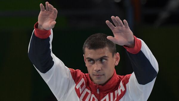 Евгений Тищенко после финального поединка по боксу на Олимпийских играх - Sputnik Южная Осетия