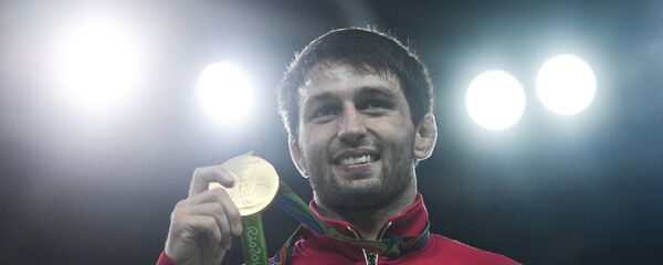 Сослан Рамонов, завоевавший золотую медаль на XXXI летних Олимпийских играх Сослан Рамонов, завоевавший золотую медаль на XXXI летних Олимпийских играх - Sputnik Хуссар Ирыстон