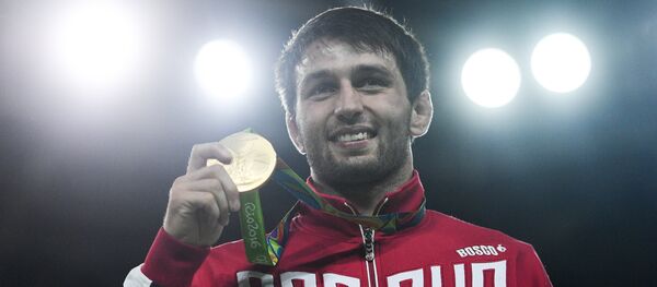 Сослан Рамонов, завоевавший золотую медаль на XXXI летних Олимпийских играх Сослан Рамонов, завоевавший золотую медаль на XXXI летних Олимпийских играх - Sputnik Южная Осетия