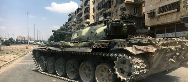 Танк на линии фронта на юго-западе сирийского города Алеппо Танк на линии фронта на юго-западе сирийского города Алеппо - Sputnik Южная Осетия