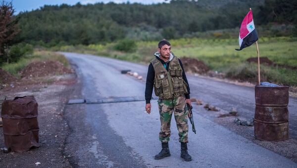 Сирийский военный на блокпосту недалеко границы с Турцией - Sputnik Южная Осетия