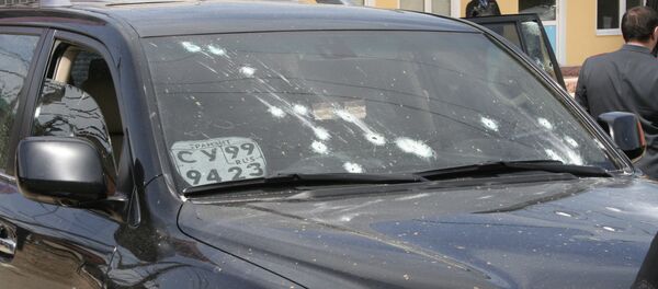 На месте обстрела автомобиля На месте обстрела автомобиля - Sputnik Южная Осетия