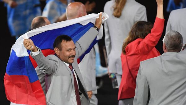 Российский флаг на открытии ХV летних Паралимпийских игр 2016 в Рио-де-Жанейро - Sputnik Южная Осетия