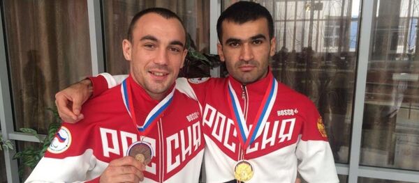 Осетинские паралимпийцы Чермен Кобесов (слева) и Гоча Хугаев - Sputnik Хуссар Ирыстон