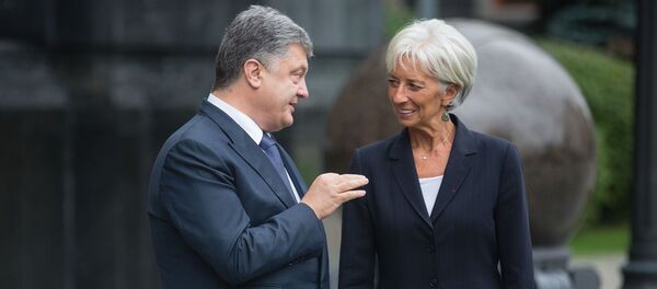 Президент Украины Петр Порошенко и директор-распорядитель МВФ Кристин Лагард Президент Украины Петр Порошенко и директор-распорядитель МВФ Кристин Лагард - Sputnik Южная Осетия