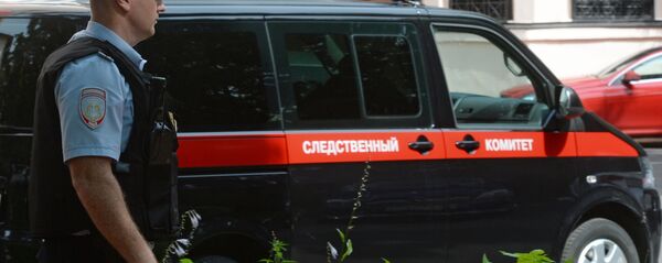 Сотрудник правоохранительных органов у здания Главного следственного управления Следственного комитета РФ по Москве Сотрудник правоохранительных органов у здания Главного следственного управления Следственного комитета РФ по Москве - Sputnik Хуссар Ирыстон