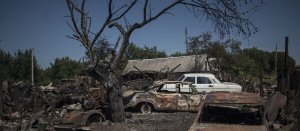 Последствия обстрела поселка Лозовое в Донецкой области - Sputnik Южная Осетия