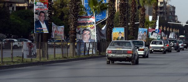 Предвыборные плакаты кандидатов в парламент Сирии - Sputnik Южная Осетия