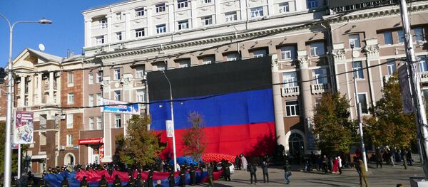 День флага Донецкой народной республики в Донецке День флага Донецкой народной республики в Донецке - Sputnik Южная Осетия