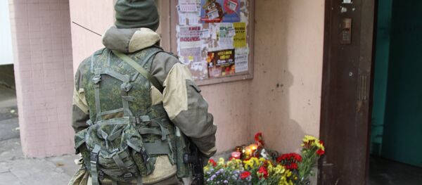 Цветы и свечи на месте гибели Моторолы - Sputnik Южная Осетия