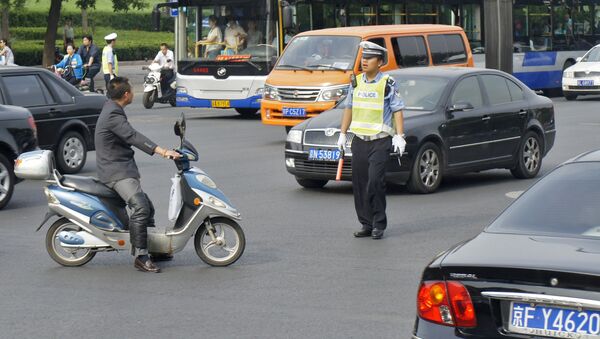 Китайские полицейские регулируют движение в Пекине - Sputnik Южная Осетия