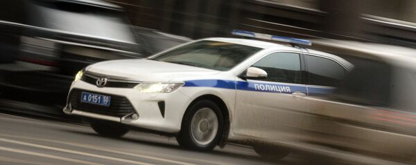 Полицейский автомобиль на Манежной площади Москвы Полицейский автомобиль на Манежной площади Москвы - Sputnik Южная Осетия