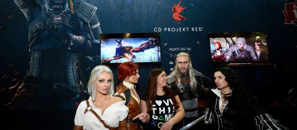 Посетители около стенда видеоигры Ведьмак на выставке ИгроМир 2014 Посетители около стенда видеоигры Ведьмак на выставке ИгроМир 2014 - Sputnik Южная Осетия