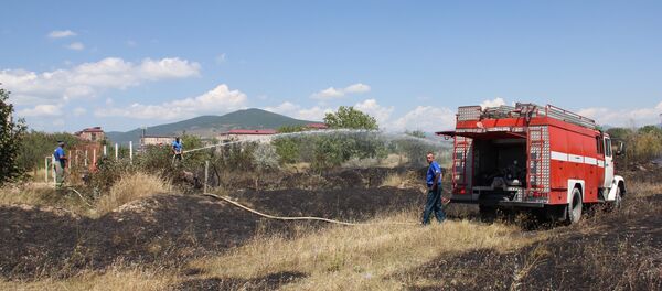 Ликвидация очагов возгорания на окраине Цхинвала Ликвидация очагов возгорания на окраине Цхинвала - Sputnik Южная Осетия