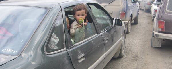 Беженцы в Южной Осетии в августе 2008 года  Беженцы в Южной Осетии в августе 2008 года  - Sputnik Южная Осетия