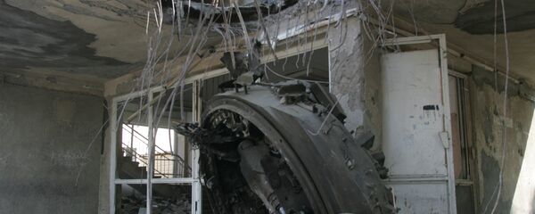 Башня танка у здания Совпрофа 2008 год Башня танка у здания Совпрофа 2008 год - Sputnik Южная Осетия