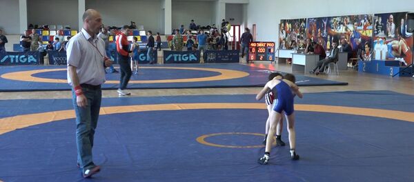 Старт Первенства Алании: юные борцы выходил на ковер Олимпа Старт Первенства Алании: юные борцы выходил на ковер Олимпа - Sputnik Южная Осетия