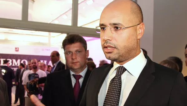 Саиф Ал Ислам Каддафи посетил выставку античного и современного искусства Ливии Пустыня не безмолвна - Sputnik Южная Осетия