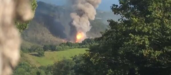 Кадры взрыва на складе боеприпасов в Абхазии Кадры взрыва на складе боеприпасов в Абхазии - Sputnik Южная Осетия