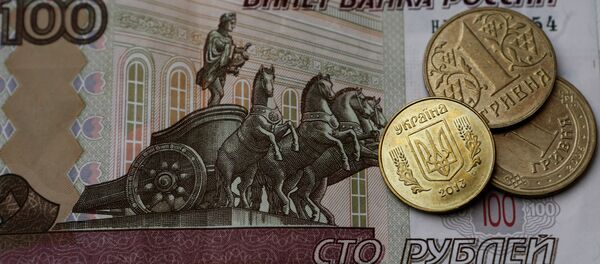 Денежные купюры и монеты России и Украины Денежные купюры и монеты России и Украины - Sputnik Южная Осетия