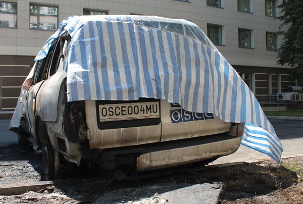 Шесть автомашин миссии ОБСЕ сгорели в Донецке - Sputnik Южная Осетия