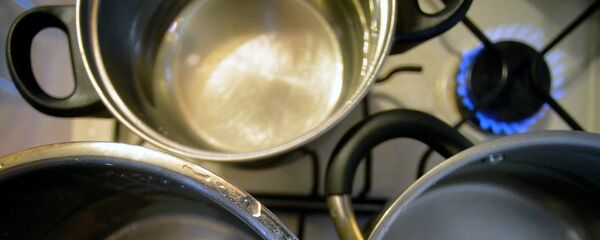 Кастрюли с водой на газовой плите Кастрюли с водой на газовой плите - Sputnik Южная Осетия