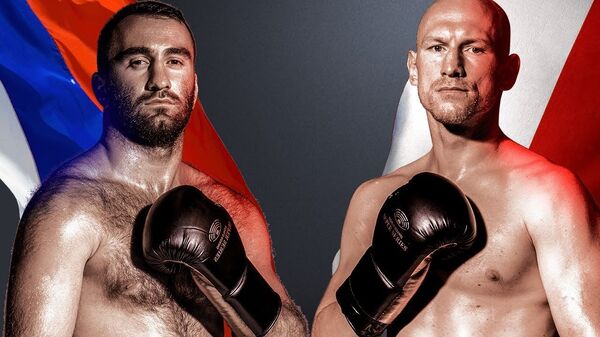 Мурат Гассиев и Кшиштов Влодарчик  Мурат Гассиев и Кшиштов Влодарчик  - Sputnik Южная Осетия