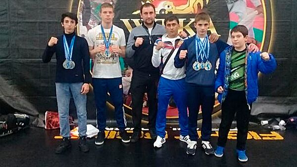 Осетинские спортсмены выступили в составе сборной России на чемпионате мира по боевым искусствам в Италии Осетинские спортсмены выступили в составе сборной России на чемпионате мира по боевым искусствам в Италии - Sputnik Южная Осетия