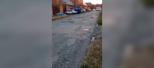 Жители ул.Братьев Газдановых бьют тревогу Жители ул.Братьев Газдановых бьют тревогу - Sputnik Южная Осетия