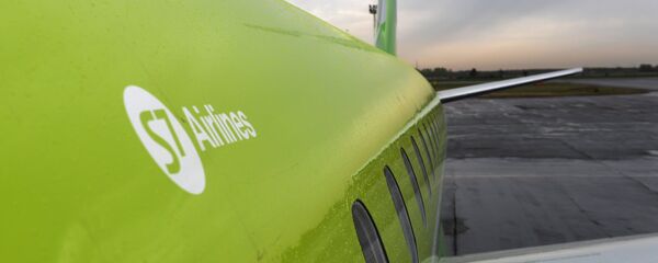 Самолет Embraer 170-LR авиакомпании S-7 в Новосибирске Самолет Embraer 170-LR авиакомпании S-7 в Новосибирске - Sputnik Южная Осетия