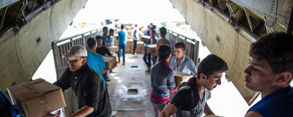 Самолет МЧС России доставил груз гуманитарной помощи в Сирию Самолет МЧС России доставил груз гуманитарной помощи в Сирию - Sputnik Южная Осетия