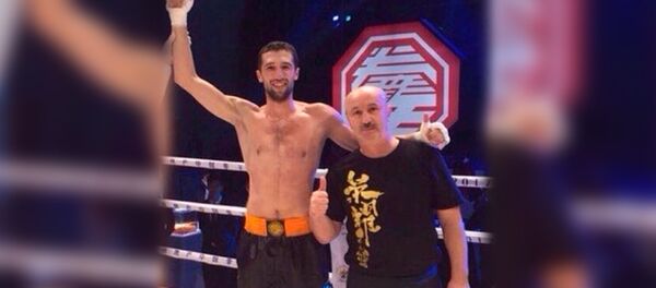 Боксер Сармат Тадтаев одержал победу в Китае - Sputnik Южная Осетия