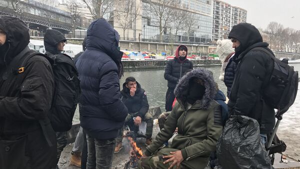 Как в Париже переживают непогоду мигранты - Sputnik Южная Осетия