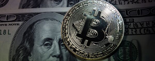 Монеты с логотипами криптовалюты биткоин Монеты с логотипами криптовалюты биткоин - Sputnik Южная Осетия